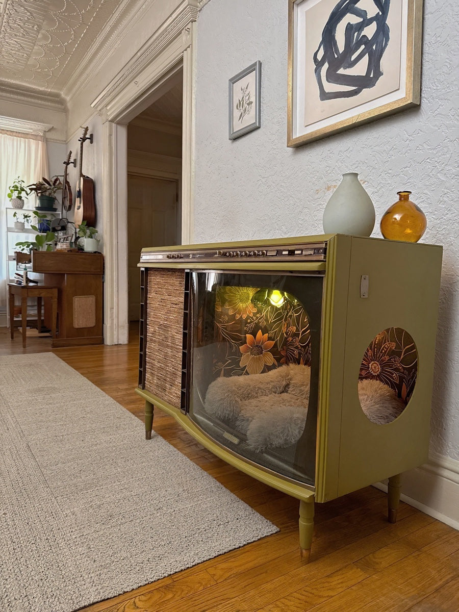 Cat bed and litter box enclosure made from 1950s TV