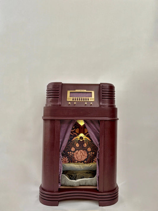 Cozy cat or small dog bed made from 1940s Philco radio